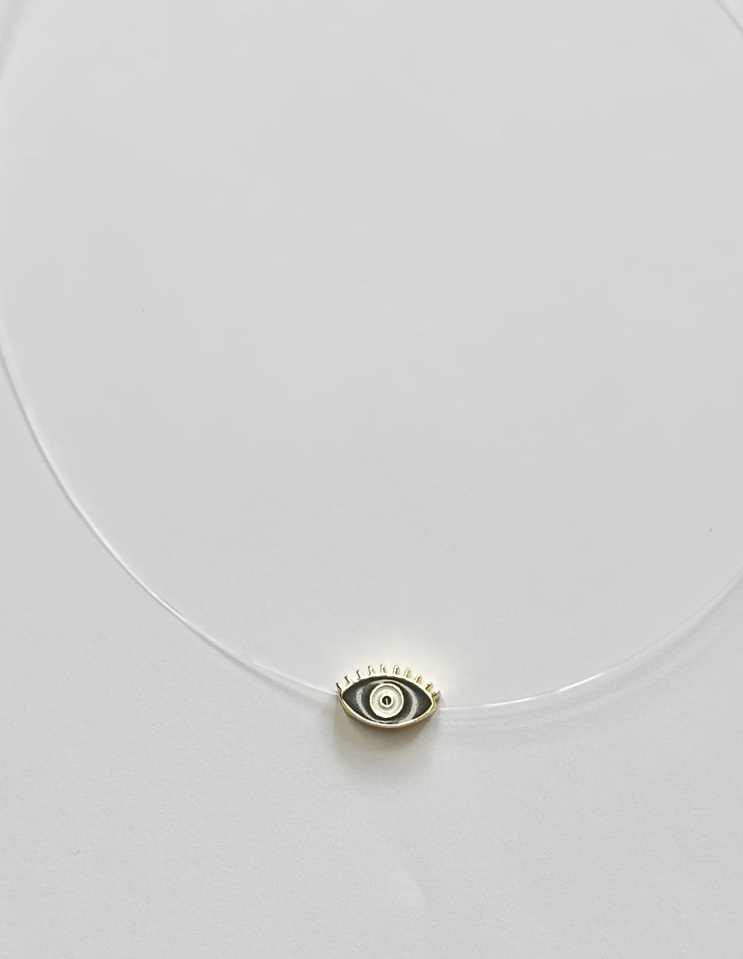 Invisible eye pendant